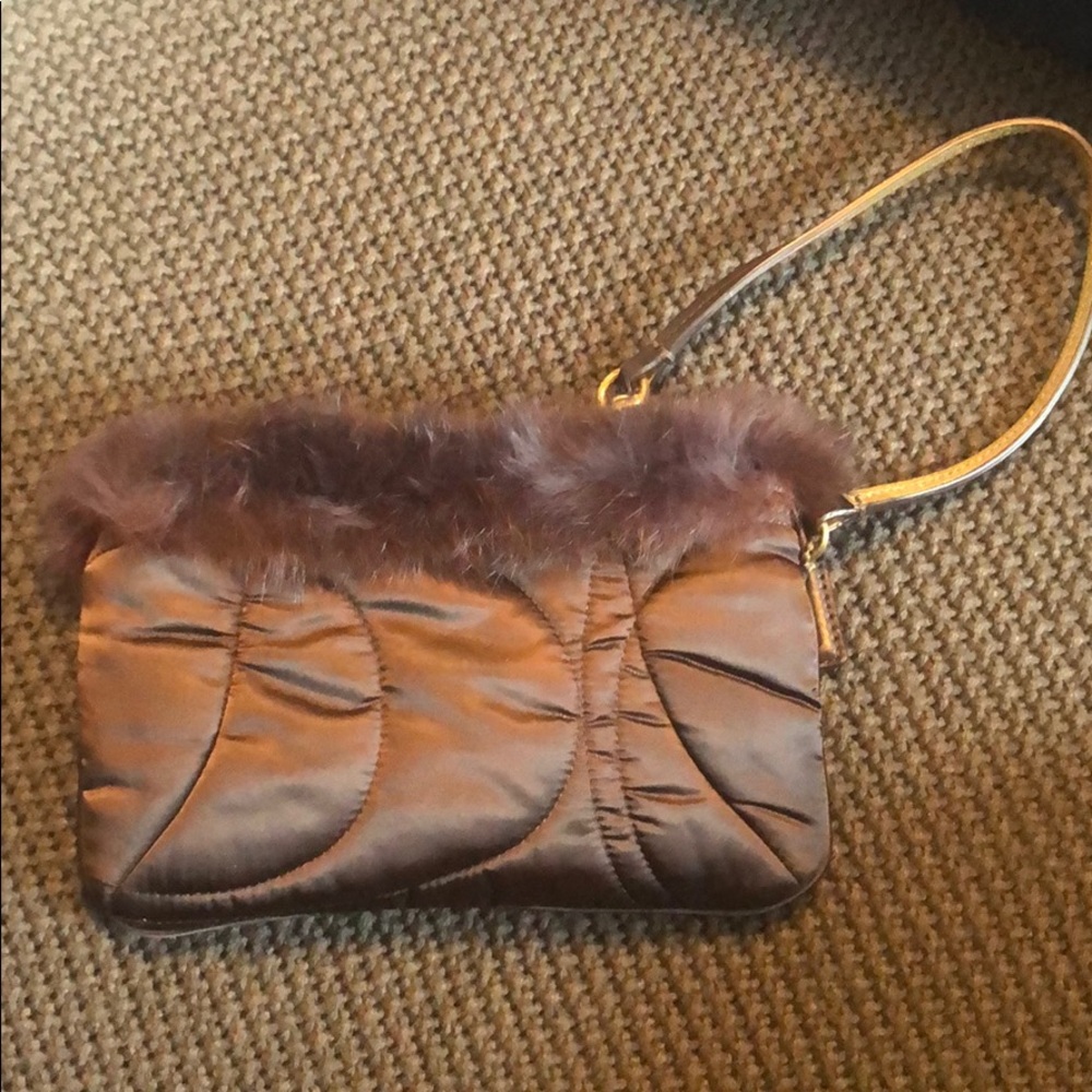 Coach wristlet with faux fur!